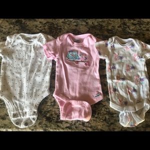 3 Newborn onesies.